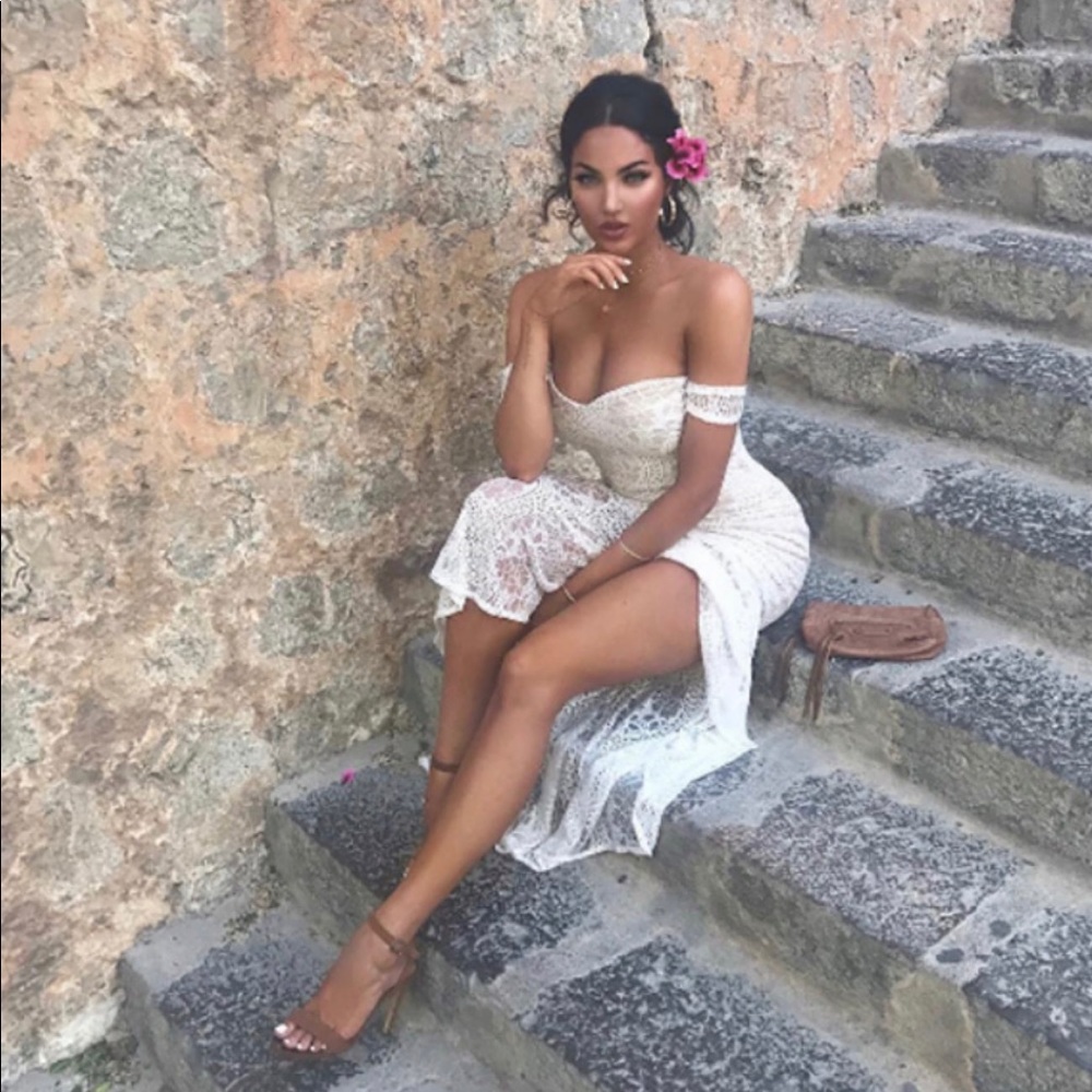 White lace Bardot fishtail dress .